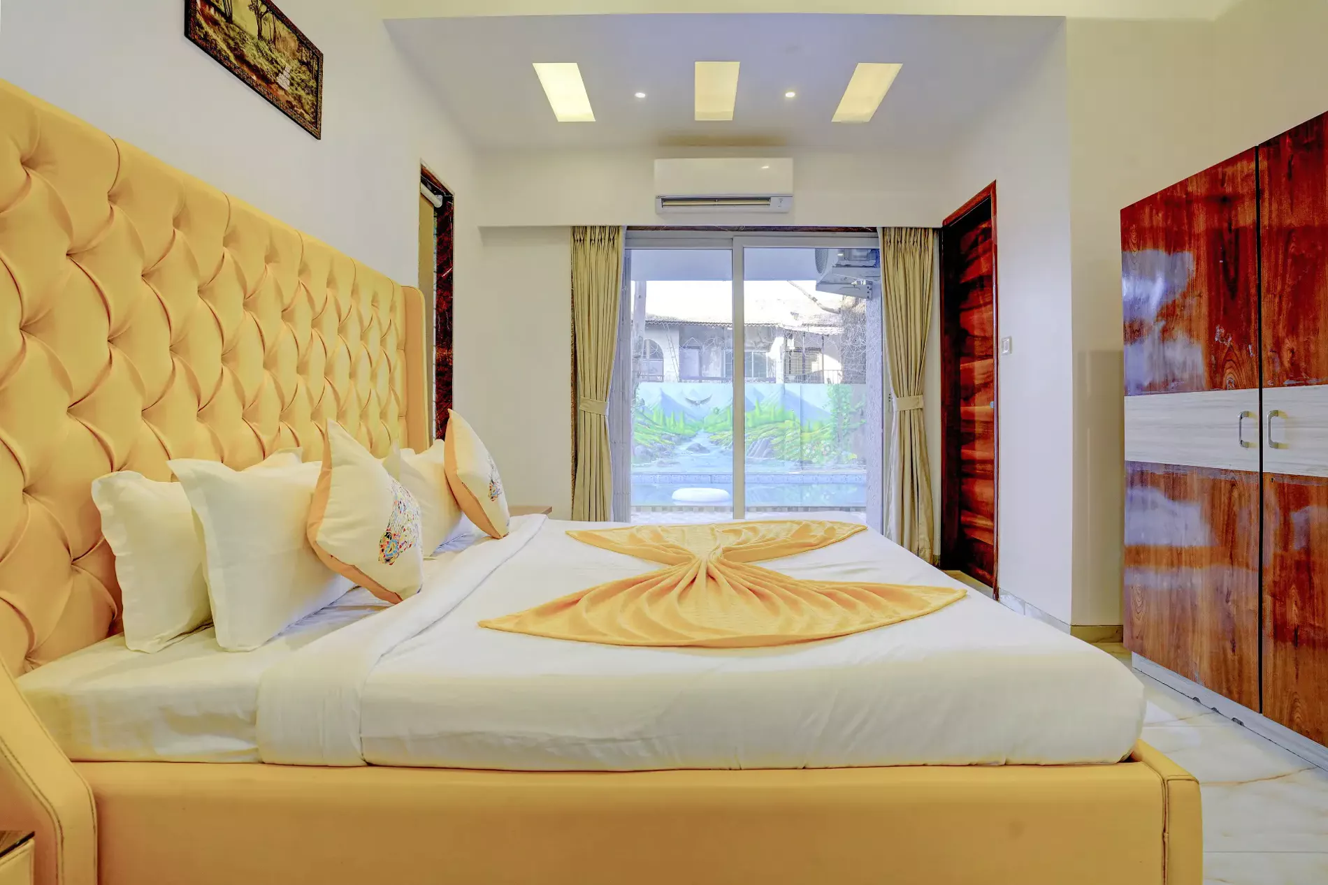 Ground-floor bedroom interior at LonavillaStay 4BHK villa