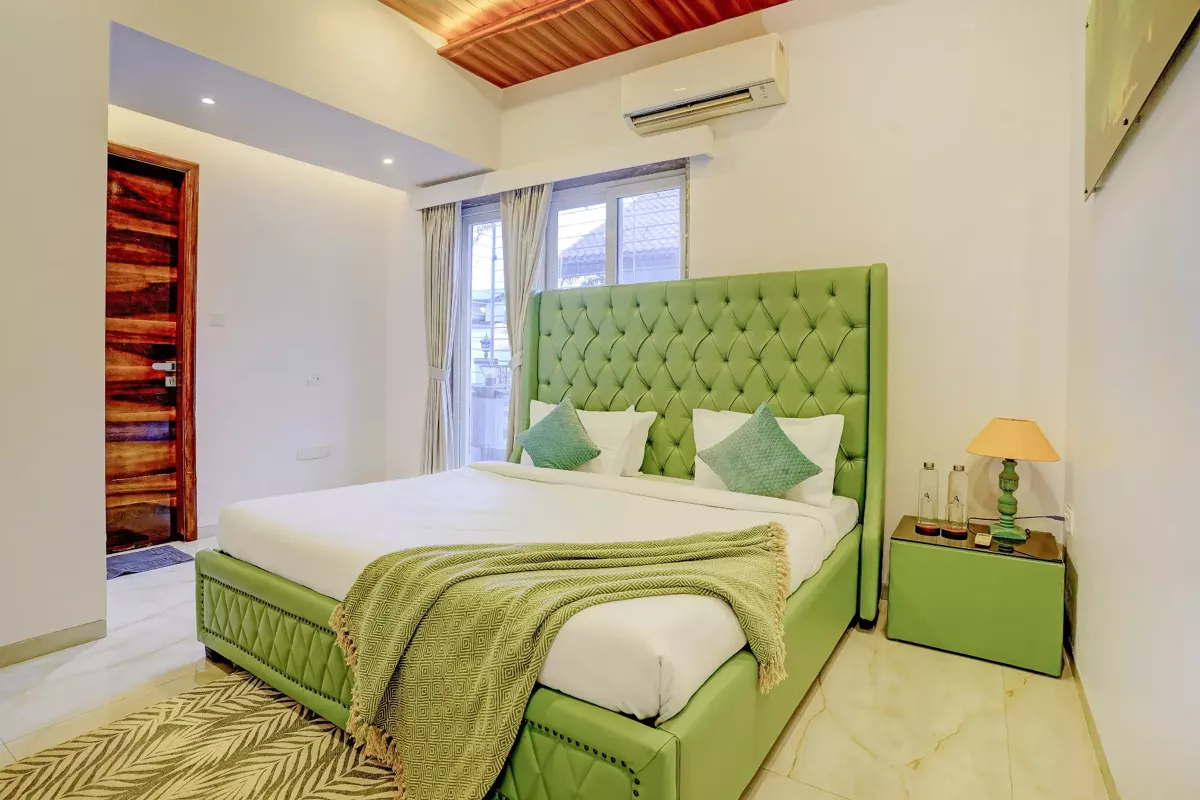 First-floor bedroom alternate angle at LonavillaStay villa