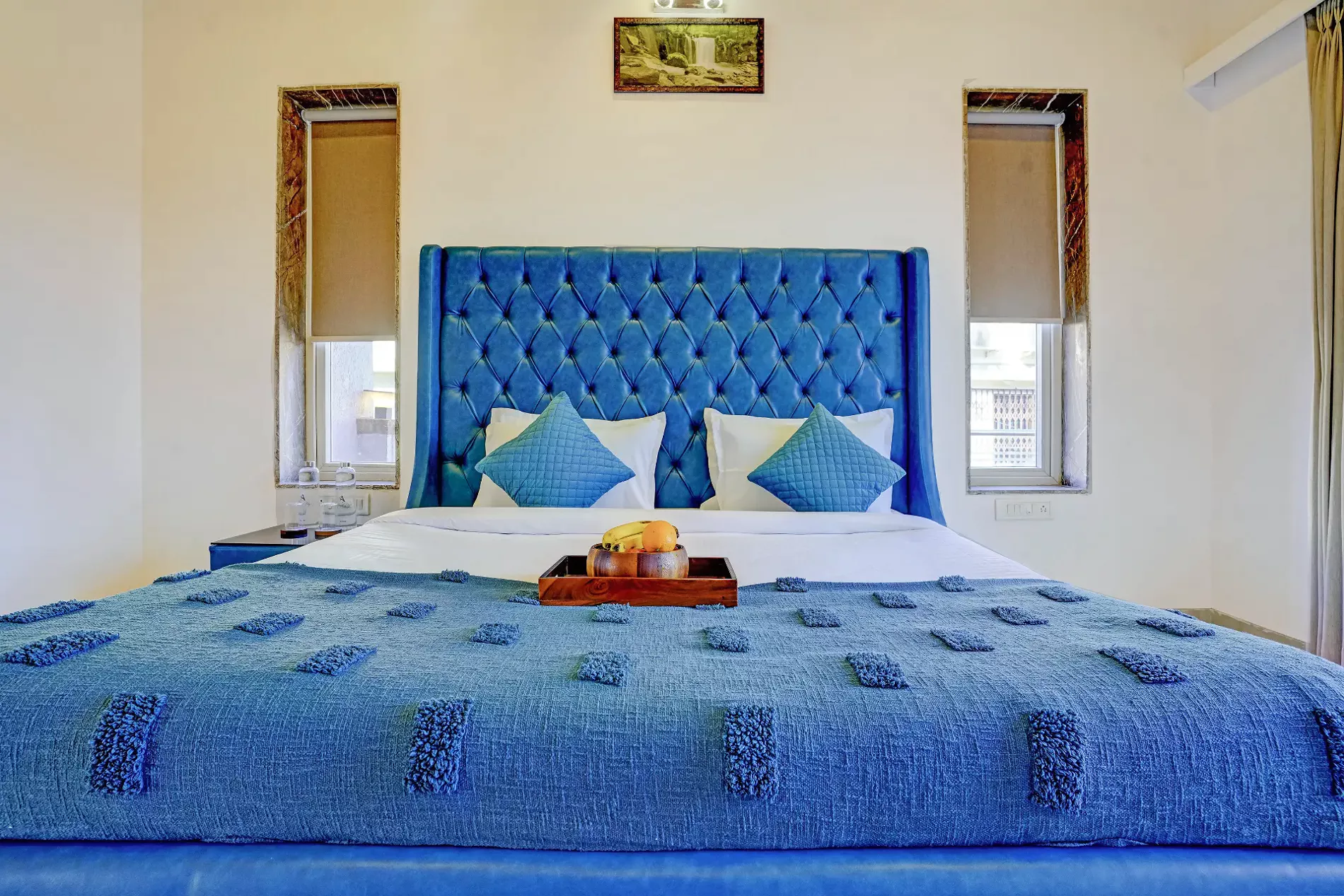 Fourth bedroom on first floor with king bed and private balcony at LonavillaStay