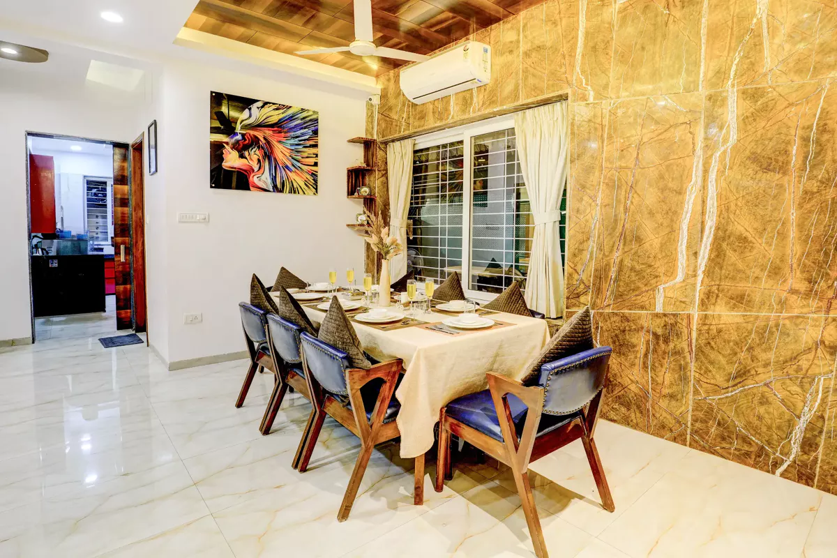 Dining hall with large table at LonavillaStay 4BHK villa