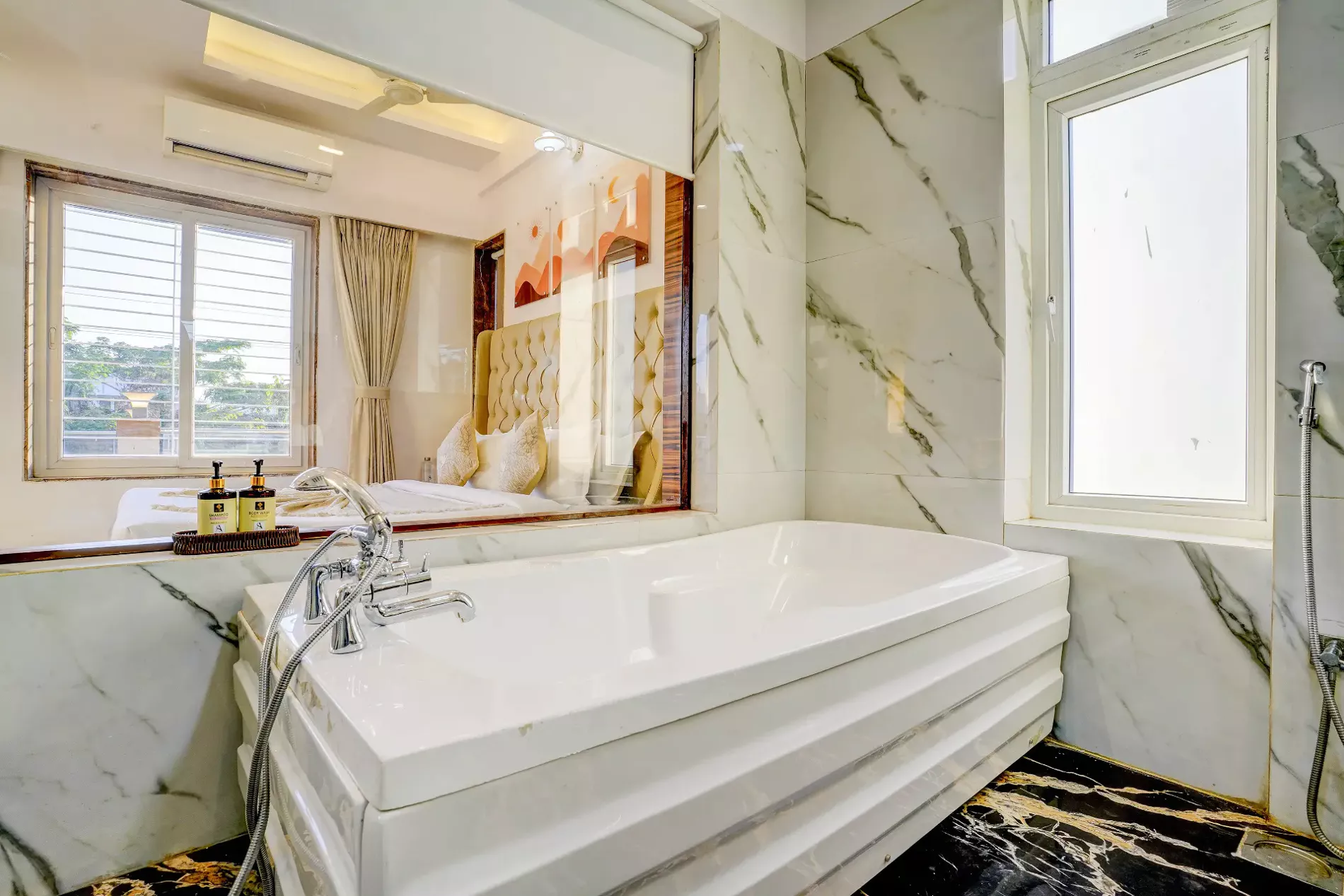 Bathtub in master suite at LonavillaStay private pool villa