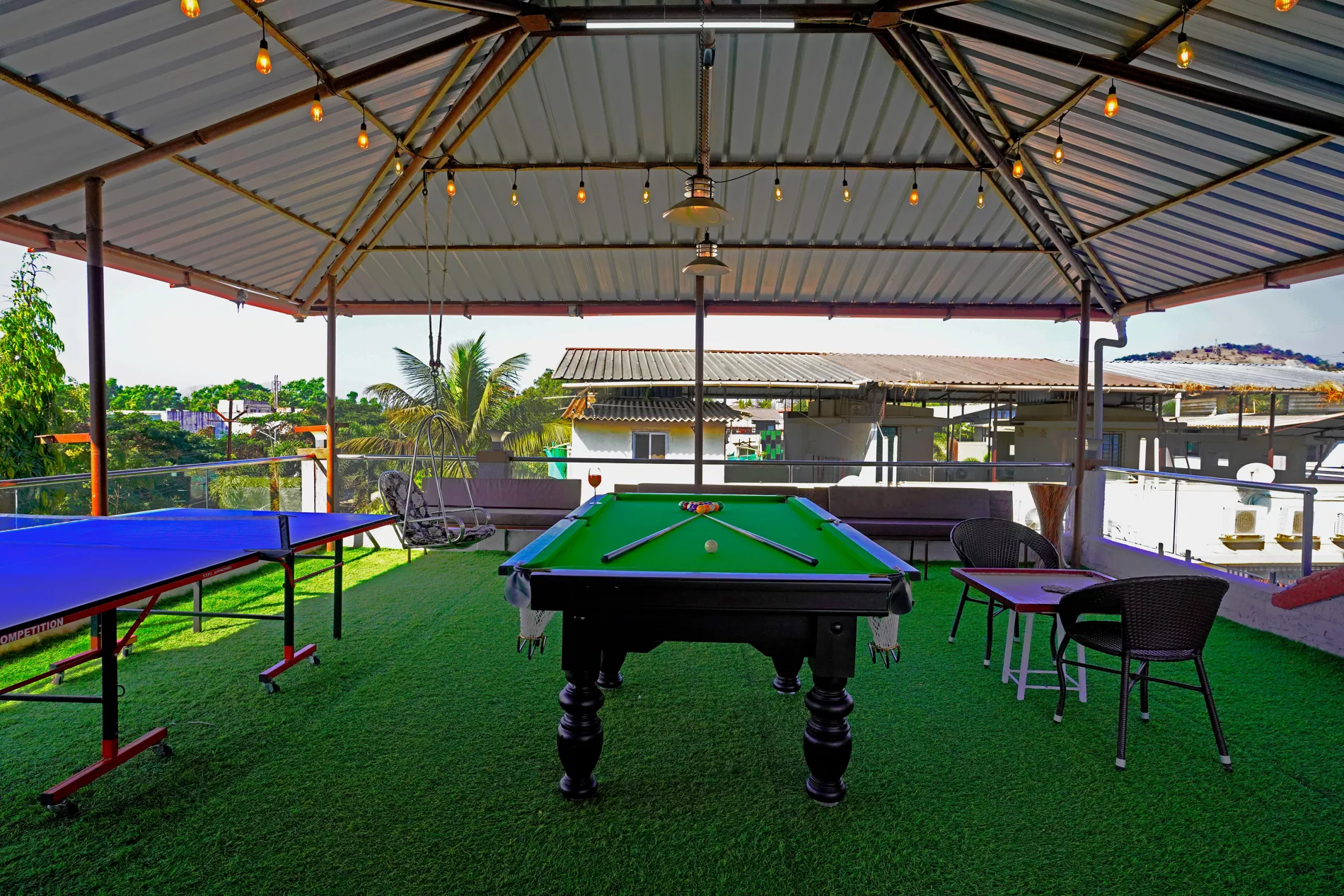Rooftop play area with snooker table and table tennis at LonavillaStay