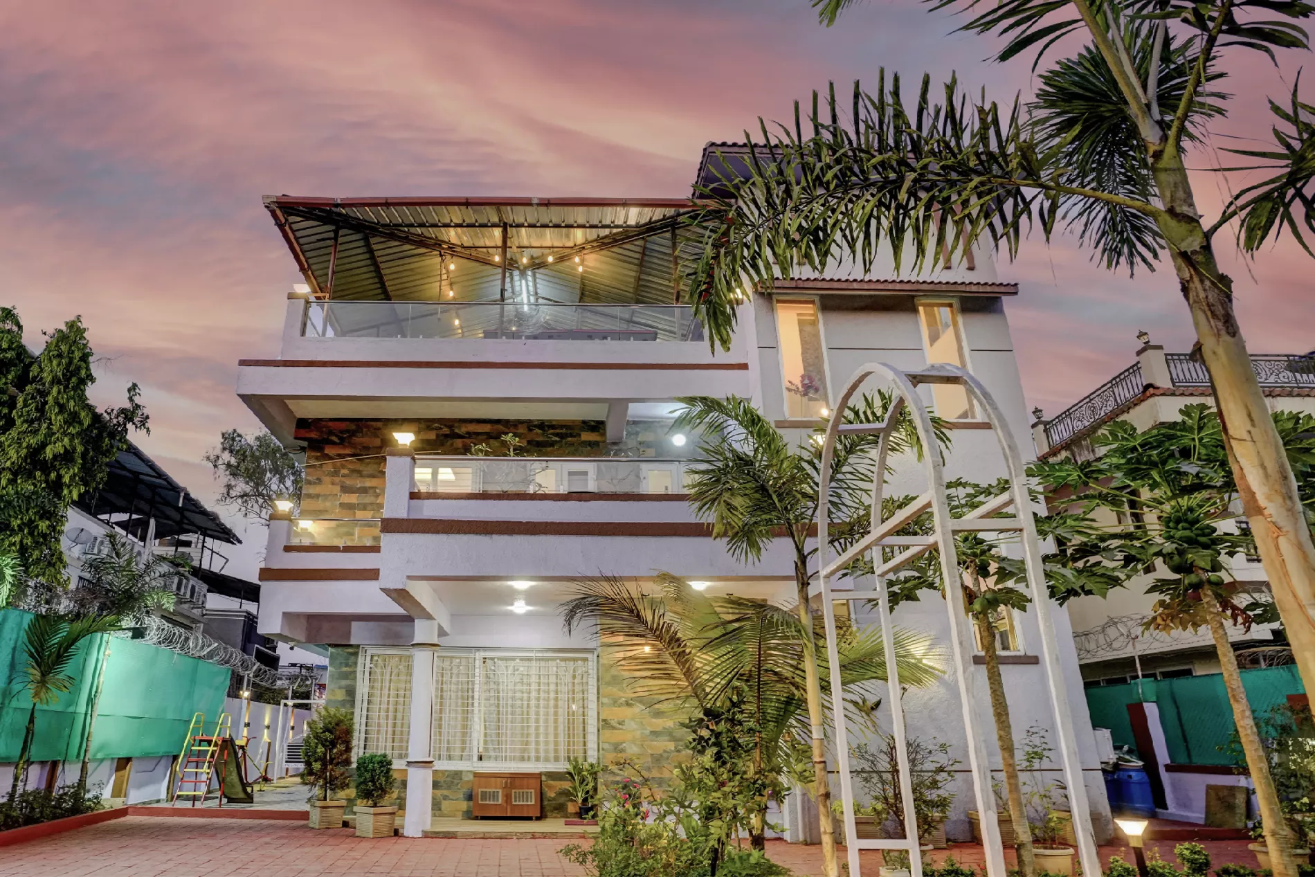 LonavillaStay villa exterior at sunset in Lonavala
